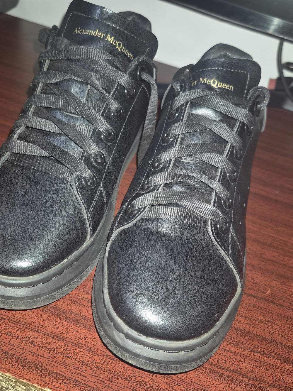 Alexander McQueen Black Leather Low-Top Sneakers with Gold Logo